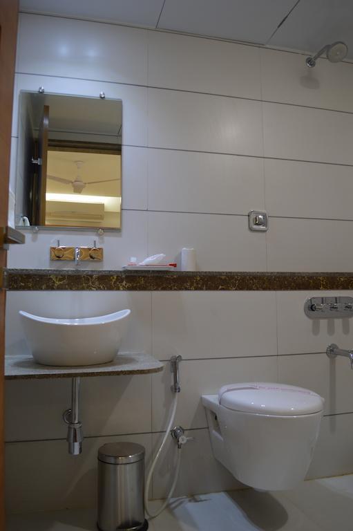 Hotel Ashray Inn Αχμπανταμπάντ Δωμάτιο φωτογραφία