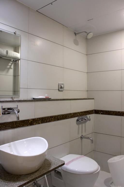 Hotel Ashray Inn Αχμπανταμπάντ Δωμάτιο φωτογραφία